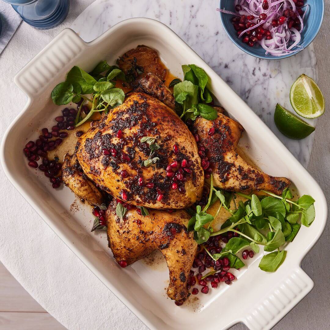 Le Creuset's Roast Harissa and Pomegranate Spatchcock Chicken